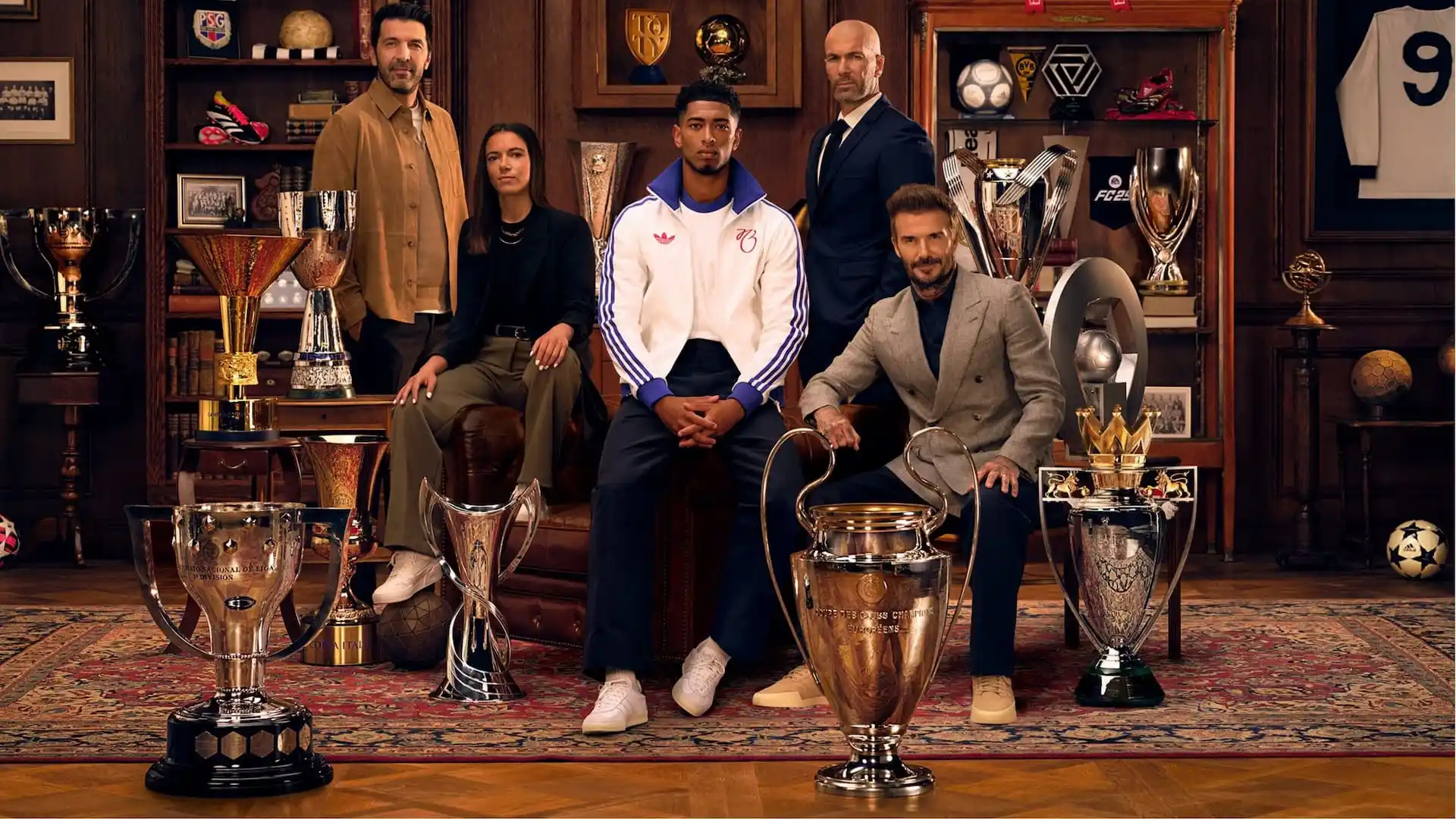 Multiple players posing with trophies.